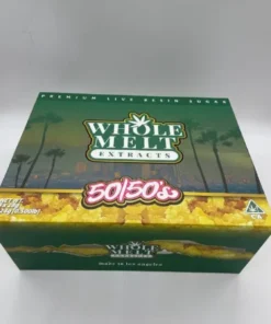 Whole Melt 50/50’s Resin premium live resin concentrate with golden texture, rich terpene profile, lab-tested hybrid extract close-up