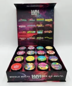 Whole Melt Exotic Edition premium live resin sugar with golden crystalline texture, rich terpene profile, and lab-tested cannabis concentrate in sealed jar