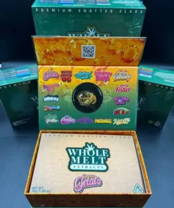 Whole Melt Banana Gelato premium shatter with golden glass-like texture, lab-tested cannabis concentrate, high-quality extract close-up view