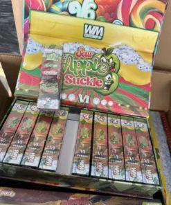 V6 Sour Apple Suckle vape pen with green apples and sour candy flavor visuals
