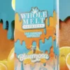 Whole Melt Extracts Bluemosa vape with blueberries and citrus orange slices in a vibrant tropical design